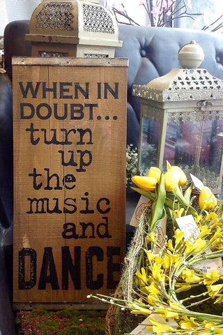 Vintage Plank 12" x 36" Brown wood Sign says in burnt dark lettering "When in doubt...turn up the music and dance"