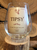 Stemless Wine Glass with vintage label that says "Tipsy"